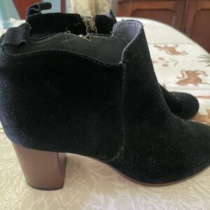 Black suede booties.